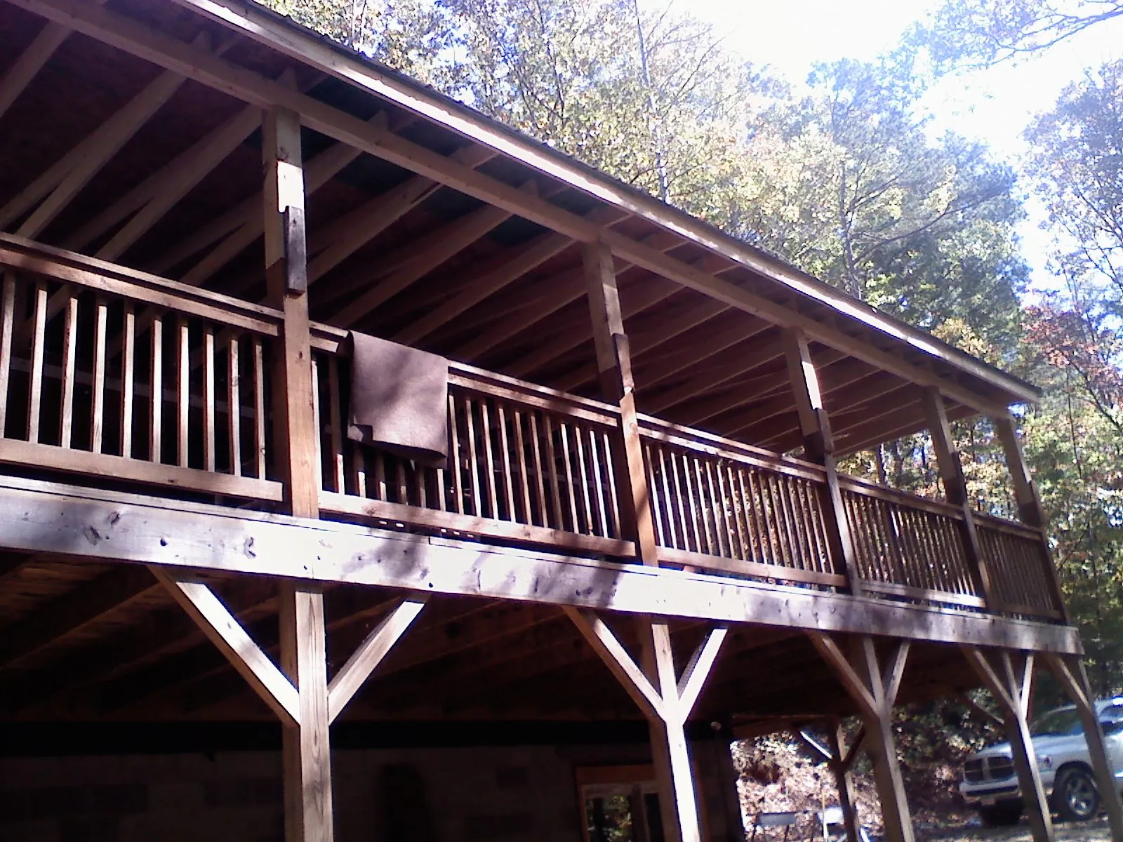 Timber framing under a new elevated porch and deck — Roof Leak Repair in Erieville by Roofing Brothers